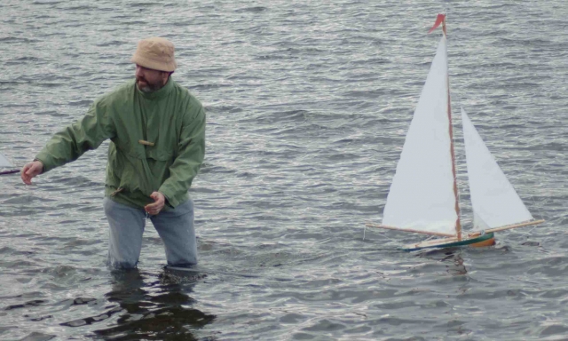 Stephen reaches for the next boat - this way of launching minimises the risk of collision.